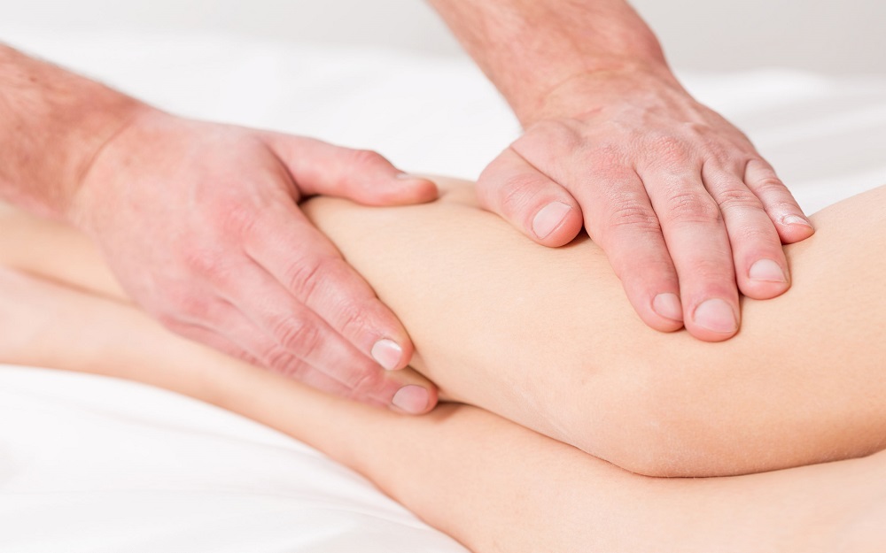 Massage lymphatic drainage therapy for swollen legs